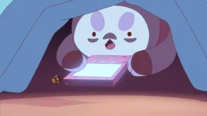 Puppycat is under the covers, intenty reading a bright mobile phone screen.